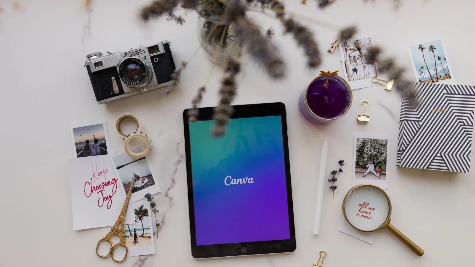 Designer working on editable Canva template layouts to sell online