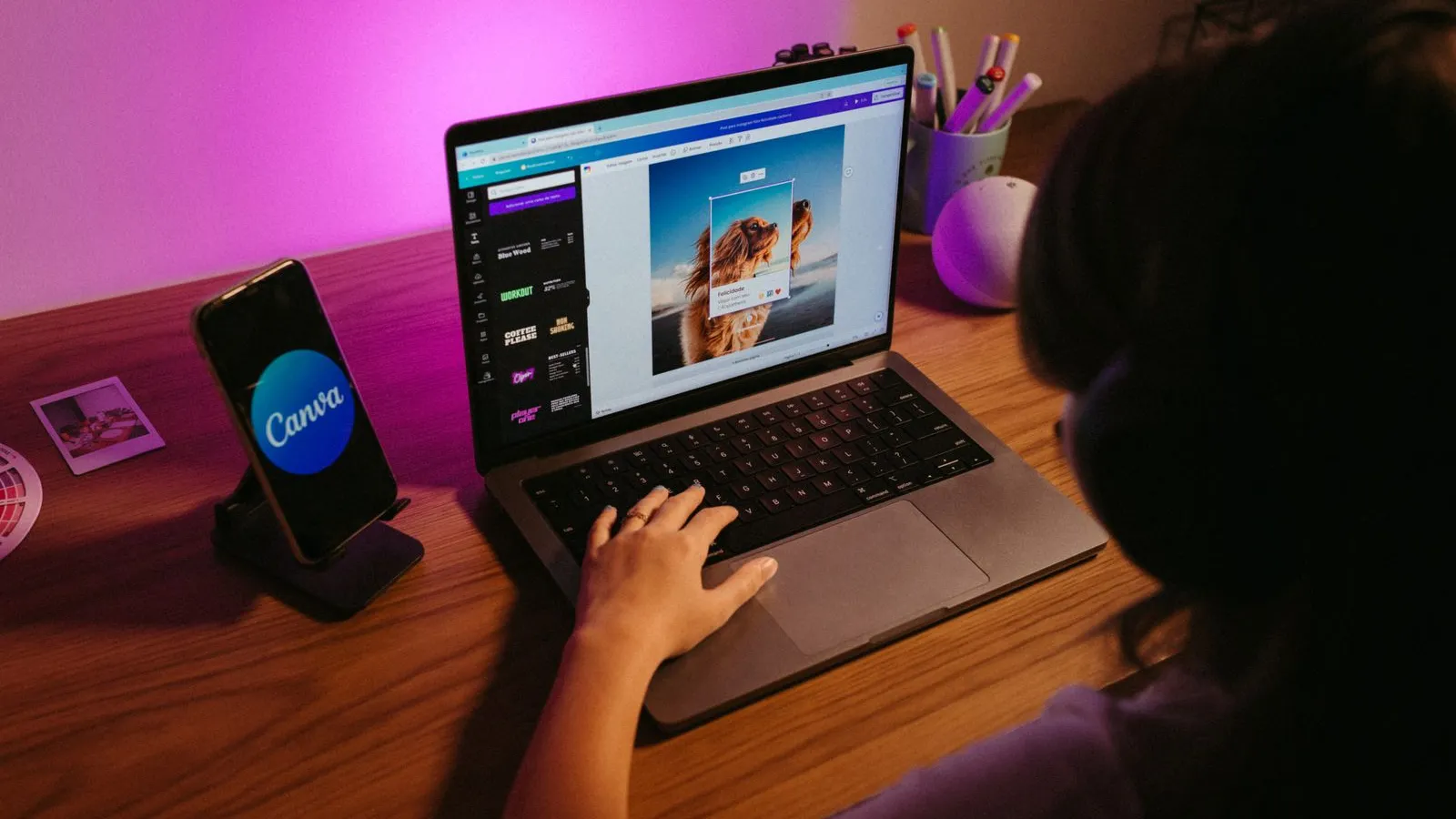 Canva templates open on a laptop for niche digital products