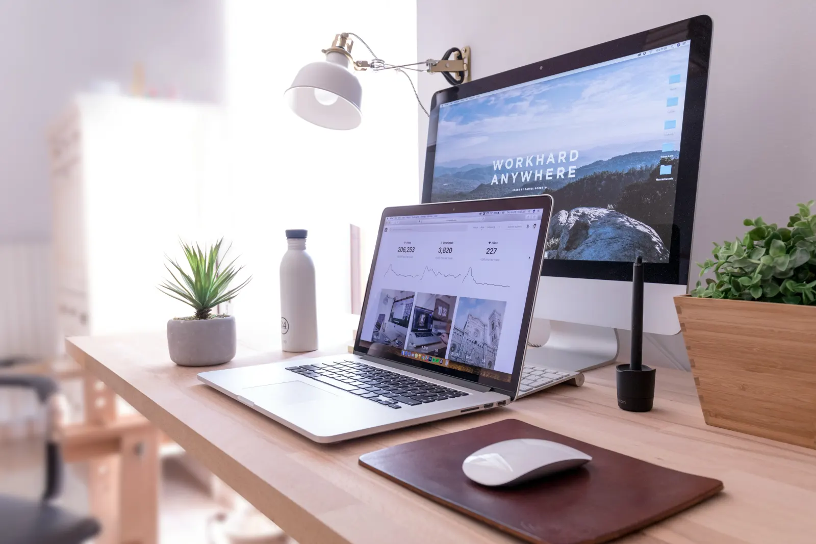 Creator workspace with laptop showing digital product files ready to sell online